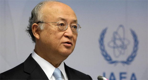 Director General of the International Atomic Energy Agency, IAEA, Yukiya Amano of Japan addresses the media during a news conference after a meeting of the IAEA board of governors at the International Center in Vienna, Austria, Monday June 8, 2015. (AP Photo/Ronald Zak)